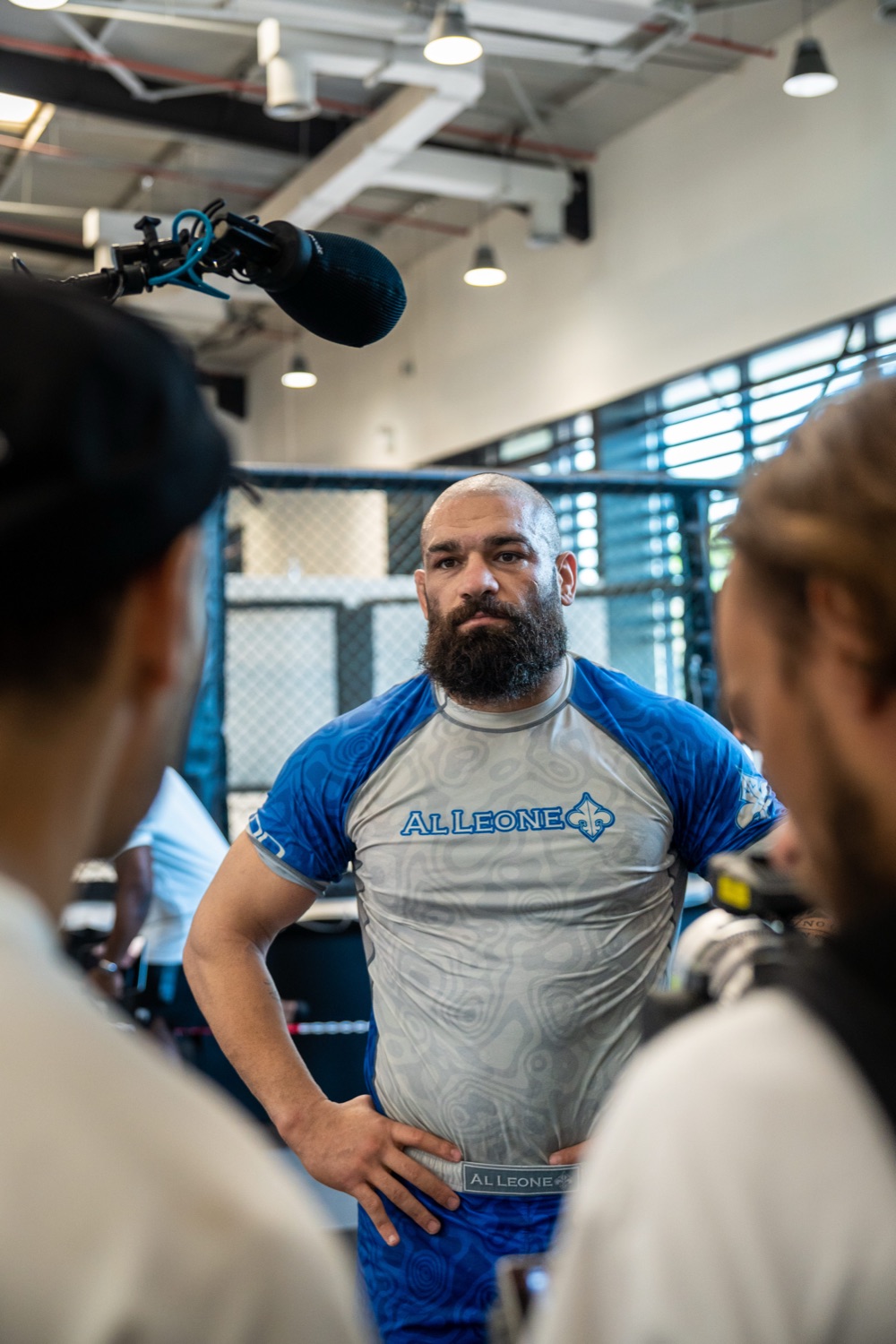 Behind-the-scenes interview with boom mic on fight night