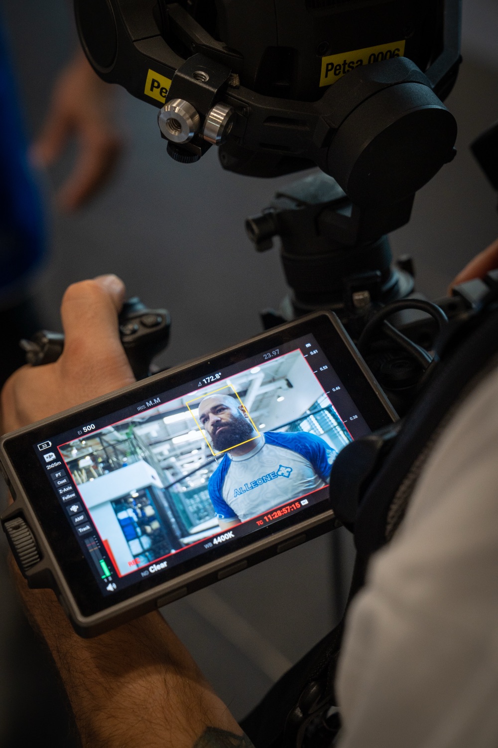 Camera monitor framing the fighter during filming