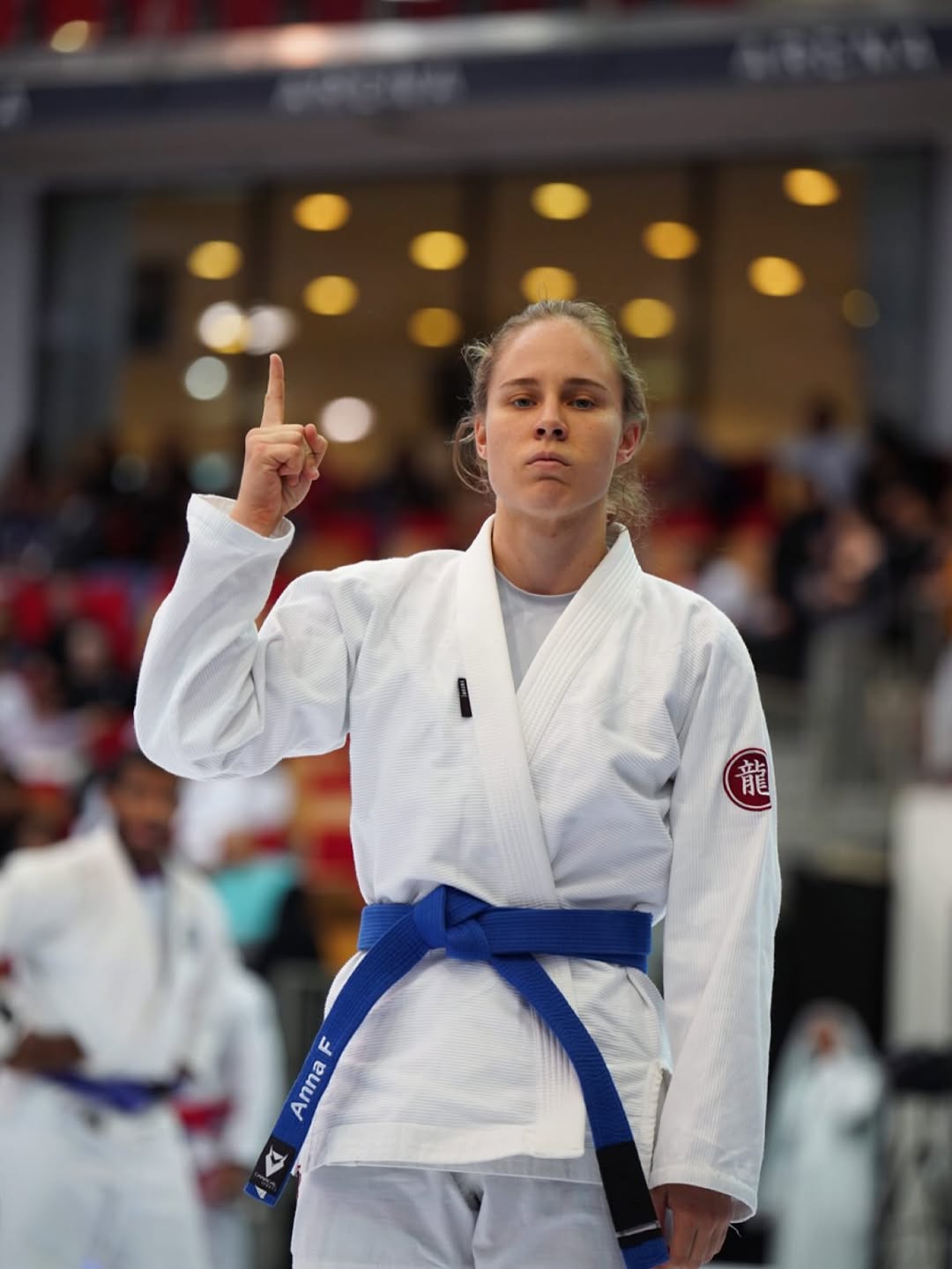 Athlete in the middle of the action on the competition mats